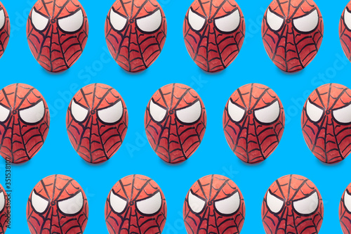 Cologne, Germany - April 13, 2020: Colorful painted spiderman Easter egg  pattern in blue isolated background Stock Photo | Adobe Stock