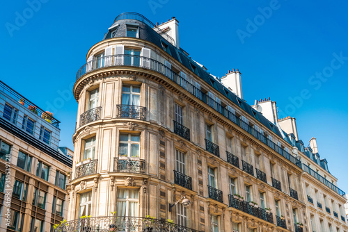 Antique building view in Paris city, France