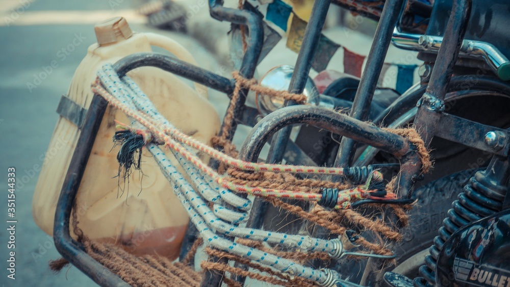 tied rope on to metal with yellow bottle tied rope on to metal with yellow bottle