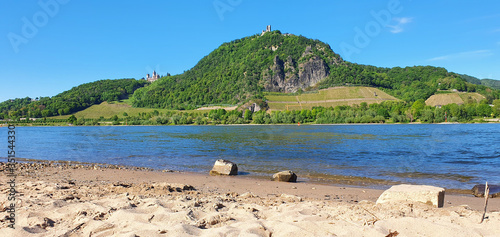 Bonn Mehlem Germany at the beginning of May 2020 in the afternoon on the Rhine with view of the Drachenfels dragonrock and castle Drachenburg in beautiful weather