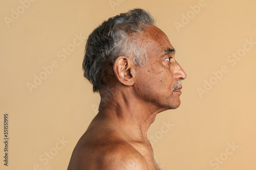 Fotografie Mixed Indian senior man side profile shot