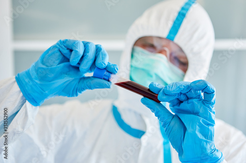 Scientist in the laboratory studies blood sampling