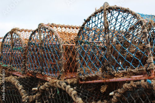 Crab cages on a beach  photo