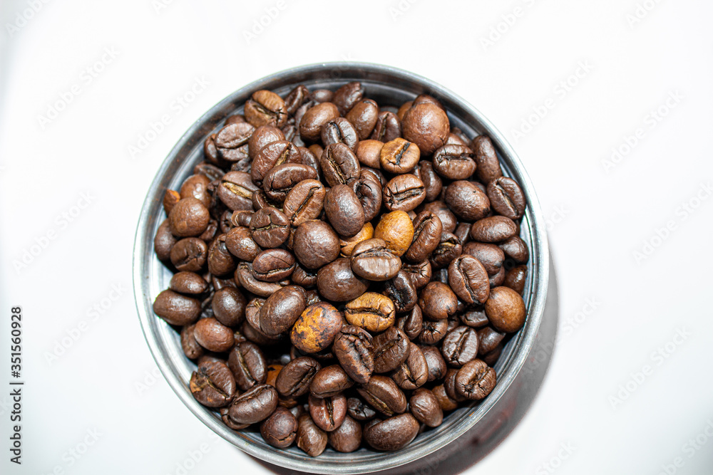 Closeup picture of coffee bean grinder and coffee bean Closeup picture of coffee bean grinder and coffee bean