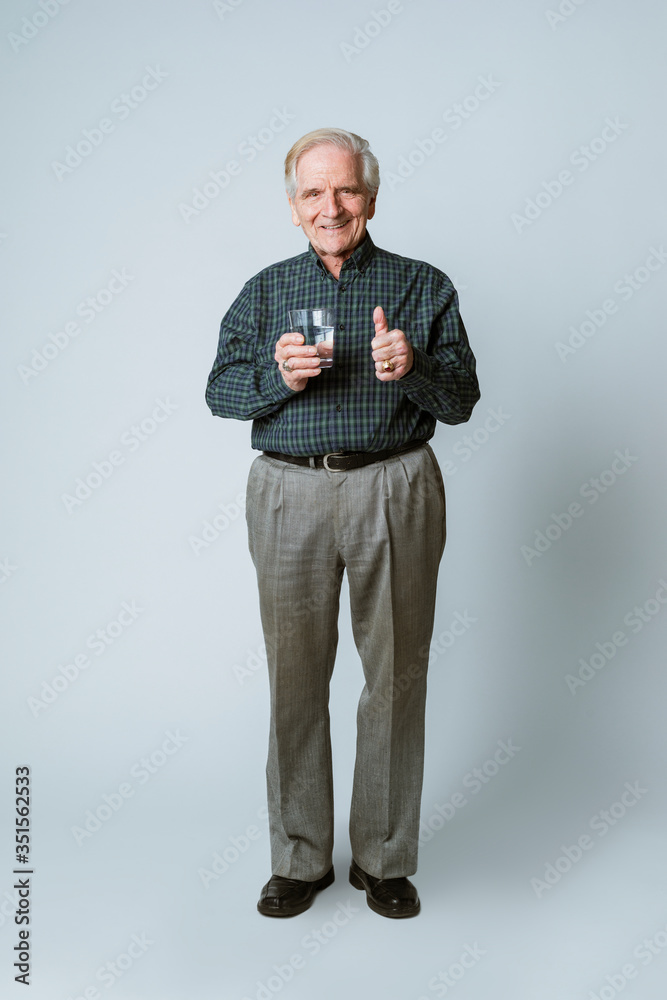 Senior man with a glass of water Senior man with a glass of water