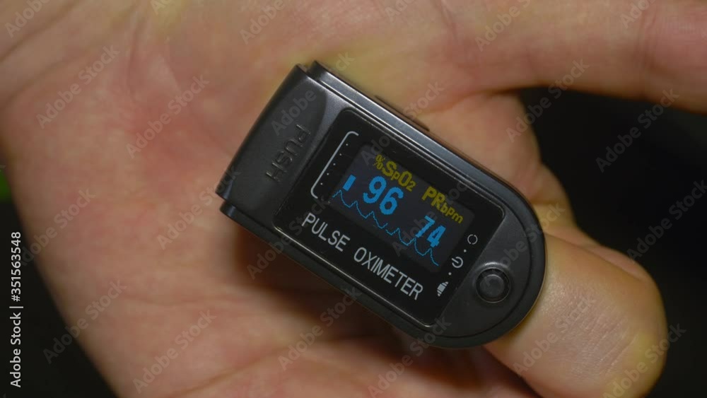 Pulse oximeter O2 saturation at 96% during test on patient index finger Pulse oximeter O2 saturation at 96% during test on patient index finger