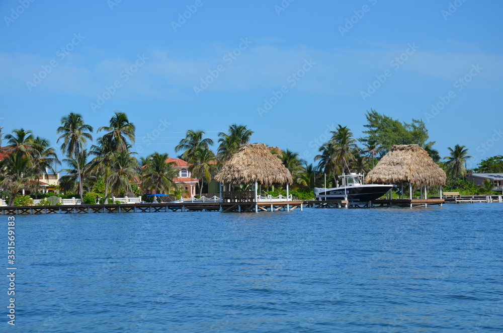 Fototapeta premium View from boat tropical beach resort in Ambergris Caye Belize