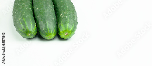 three cucumbers isolated on a white background