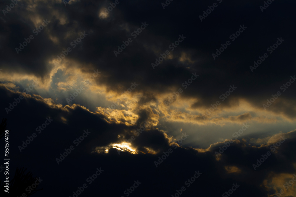 Obraz premium Mad eyes made with storm clouds at the sky