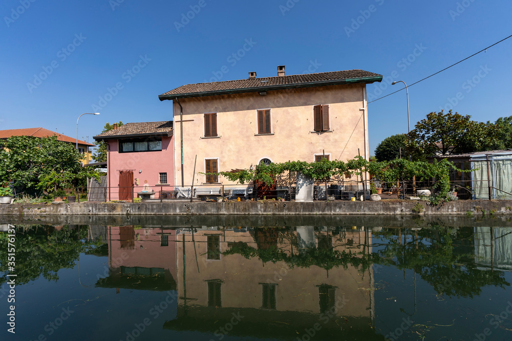Old buildings along Naviglio Pavese, Italy