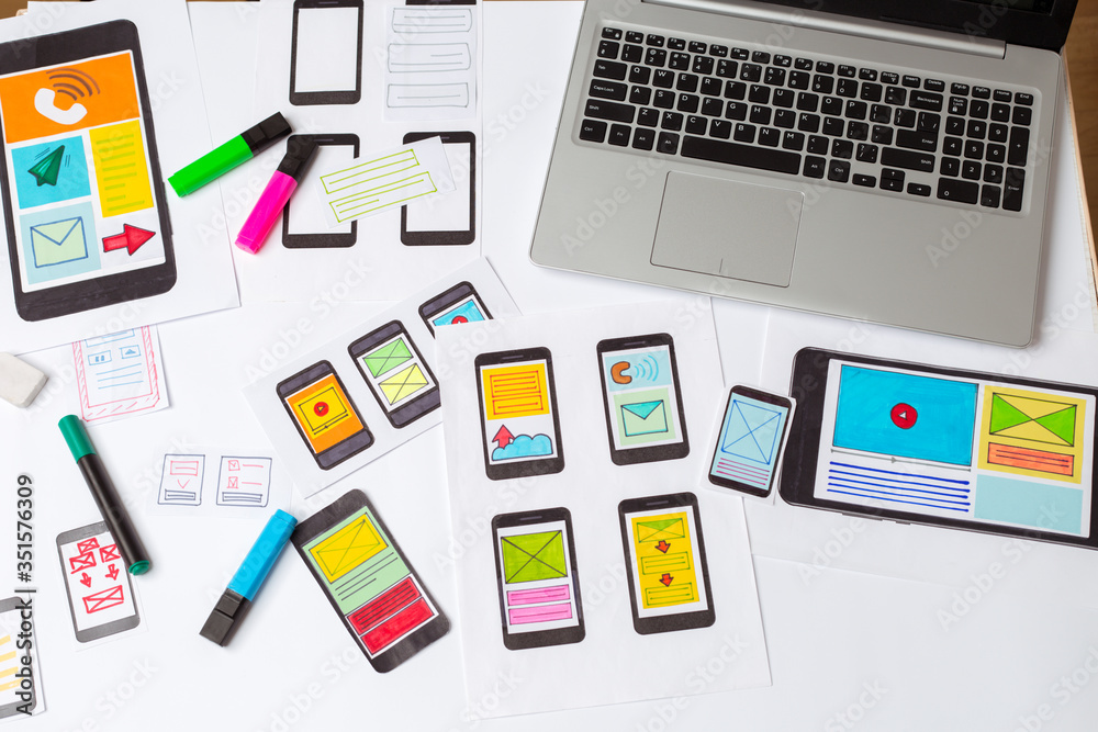 Workplace web designer application developer to a smartphone. Sketching the interface. Workplace web designer application developer to a smartphone. Sketching the interface.