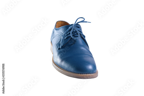 Blue leather shoes in perspective and isolated on white © olga pink