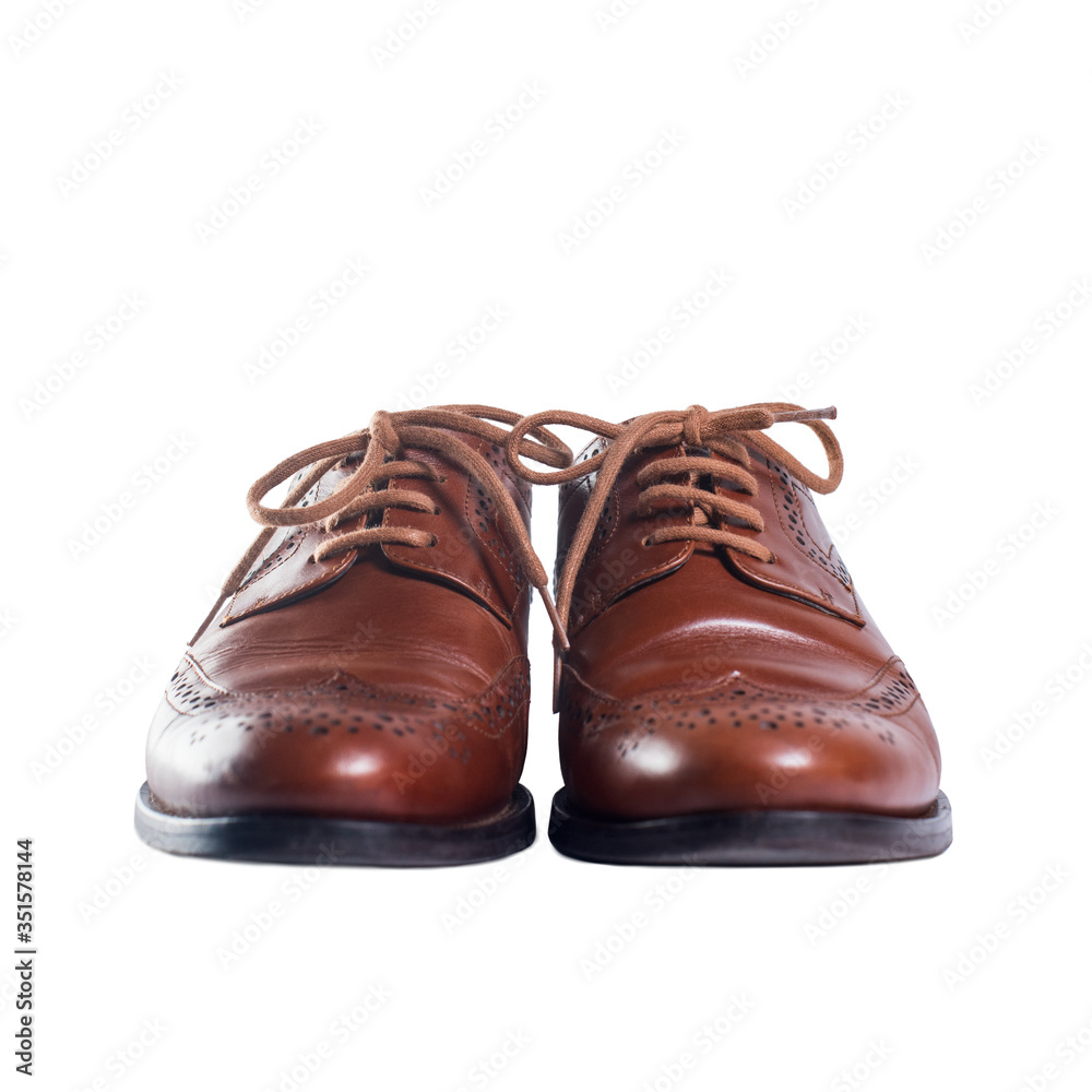 Classic brown leather pair of shoes standing front