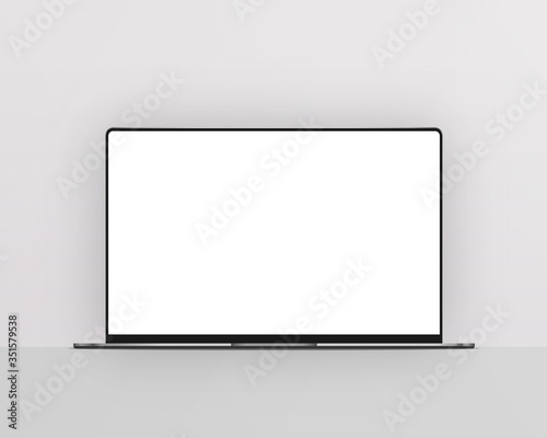 Laptop computer on gray background. Laptop computer with blank white screen mockup. Photo mockup with clipping path.