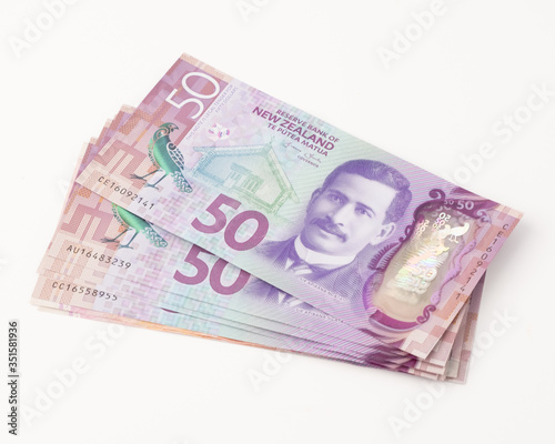 Closeup Stack of New Zealand 50$ Dollar banknotes on white background with copy space for text