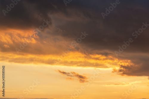 orange sunset sky with lighted clouds © Alrandir