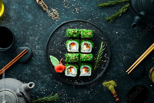 Green sushi. Japanese sushi with Chuka salad. Asian Diet Food. Top view.