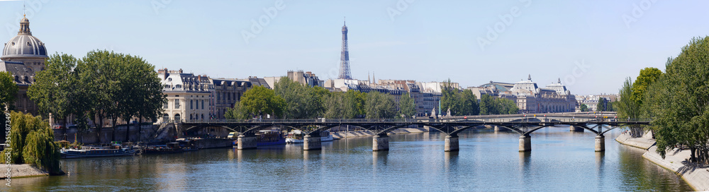 Panoramic view of Paris with Pont des Arts and the Eiffel tower.