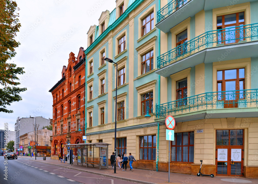 Fototapeta premium KRAKOW, POLAND. Street scene with old buildings in The old Jewish quarter called Kazimierz in Krakow