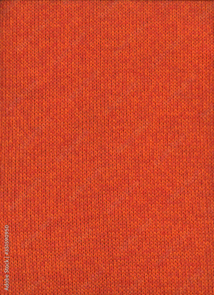 Fototapeta premium Orange knit wool texture background