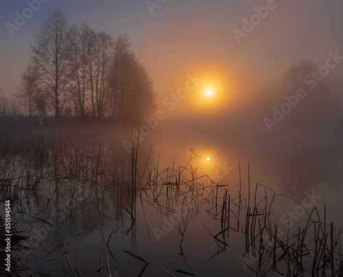  foggy sunrise on the lake