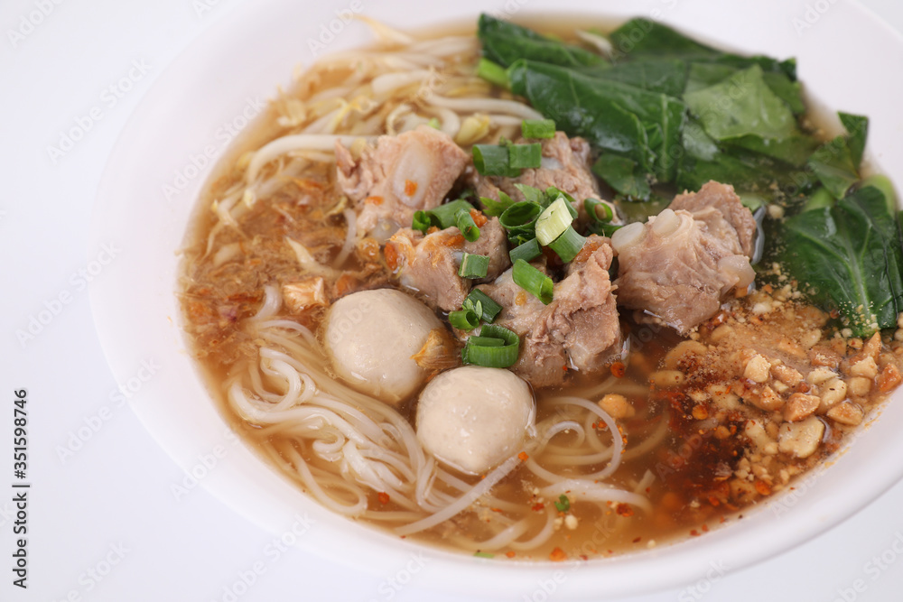 Local Thai food , Noodle with meat ball and pork isolated in white background Local Thai food , Noodle with meat ball and pork isolated in white background