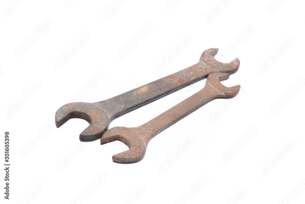 Old rusty wrench isolated on white background. Old rusty wrench isolated on white background.
