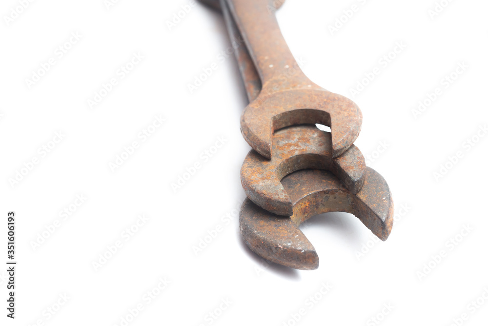 Old rusty wrench isolated on white background. Old rusty wrench isolated on white background.