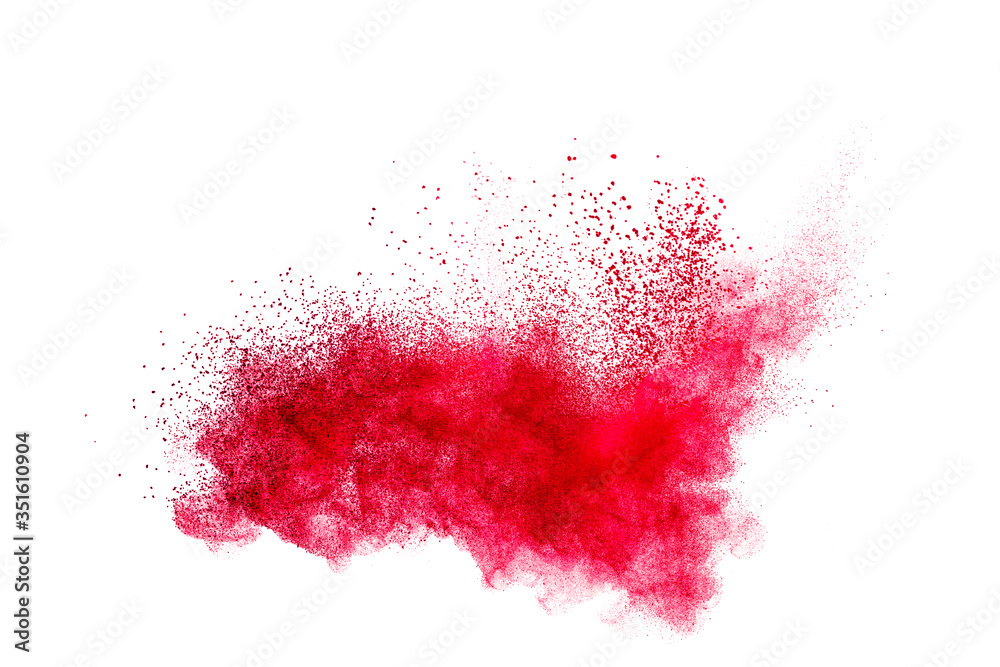 Red dust particles explosion on white background.Red sand splatter. Red dust particles explosion on white background.Red sand splatter.