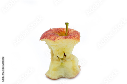 Ripe red apple core after Bitten on white background