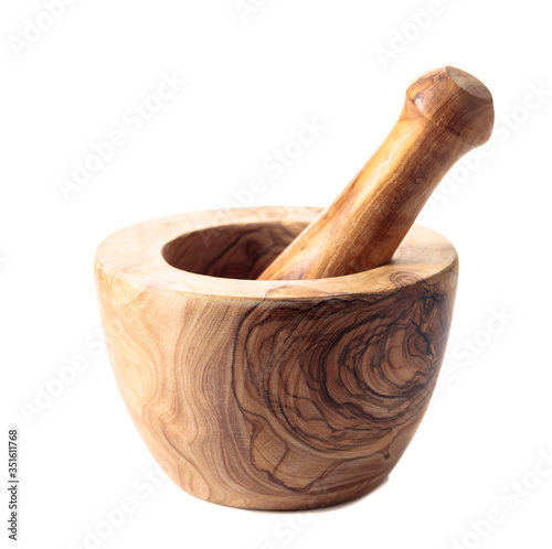 Wooden mortar and pestle isolated on a white background.