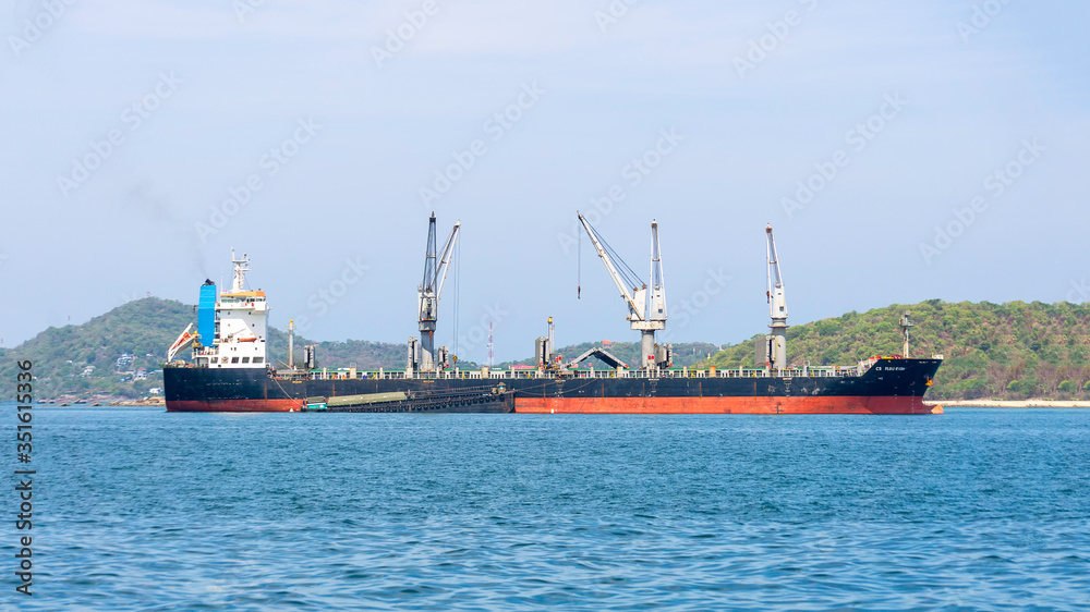 Chon Buri, Thailand 20 May, 2019 :Cargo freight ship and cargo container working with crane at port area,Logistic 
