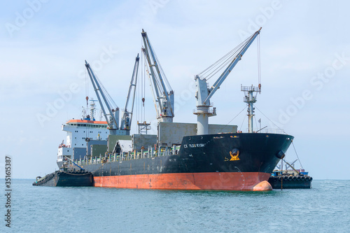 Chon Buri  Thailand 20 May  2019  Cargo freight ship and cargo container working with crane at port area Logistic 