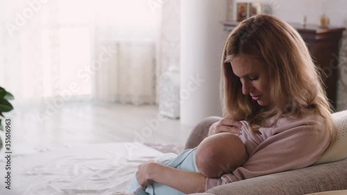 close-up woman breastfeeding her baby
