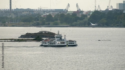 The ferry moves from Suomenlinna to Helsinki, Finland.