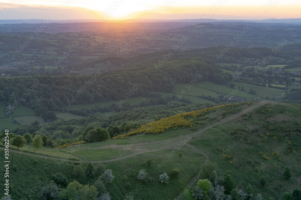 Fototapeta premium Malvern Hills countryside aerial view at sunset with hiking trails