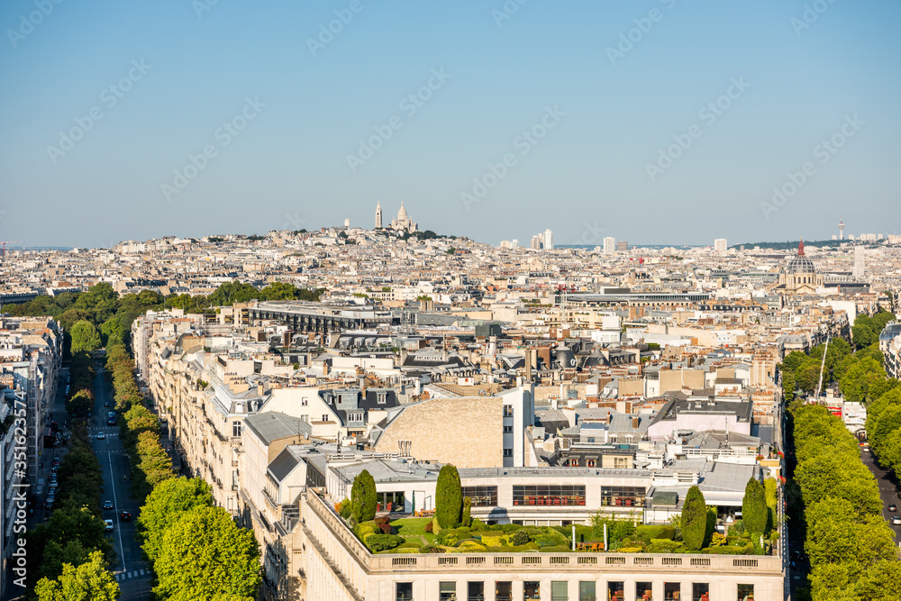 Aerial view of the old town of Paris, from the top of the Arc de Triomphe at the Champs-Elysees Avenue in Paris, France