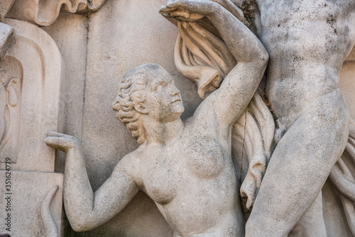 Statue next to the fountain in front of the Palais de Chaillot, a building at the top of the Chaillot hill in the Trocadero area in the 16th arrondissement of Paris, France.