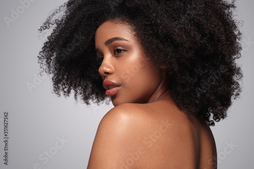 Young black model looking over shoulder