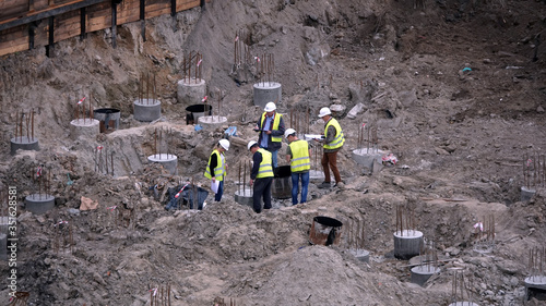 Workers - zero-cycle construction of the foundation of an entertainment center