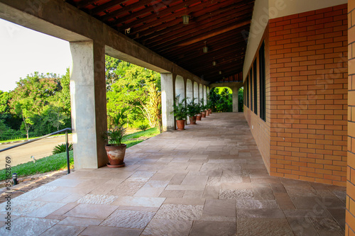 The huge balcony or terrace on the fa  ade of the S  o Bento Monastery  a public place in Brasilia  a Catholic temple and masses with Gregorian chant  a place for meditation and worship