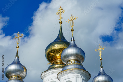 domes of an Orthodox church of gold and silver metal