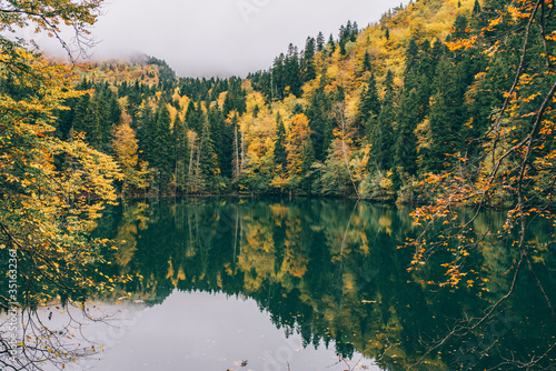 Fototapeta Naklejka Na Ścianę i Meble -  Autumn Lake In The Mountains