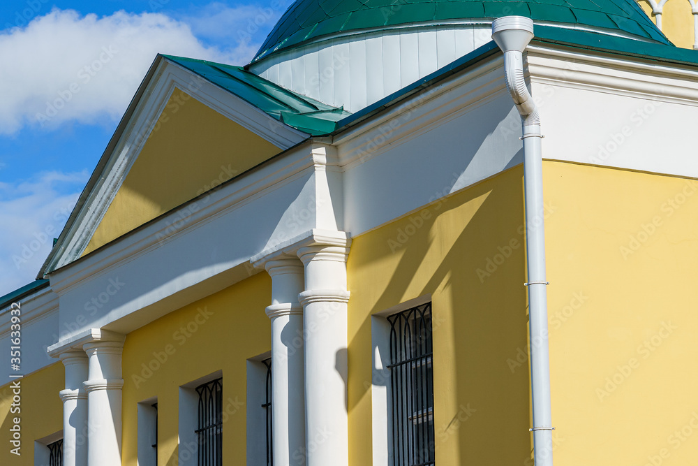 fragment of the facade of a historic building, a merchant's mansion in a Russian city