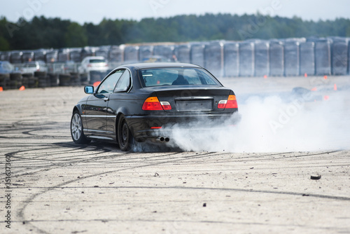 Sport car during drifting. Sport car during drifting.