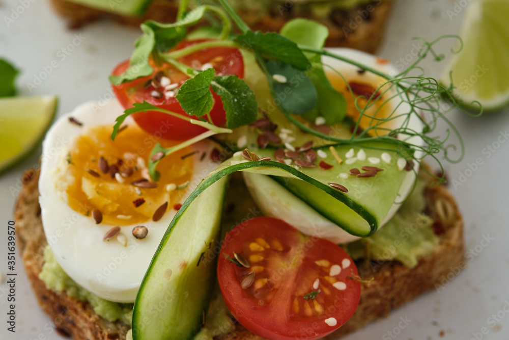 Healthy Breakfast with Wholemeal Bread Toast and Egg with Green Salad, Avocado and Peas. Healthy Breakfast with Wholemeal Bread Toast and Egg with Green Salad, Avocado and Peas.