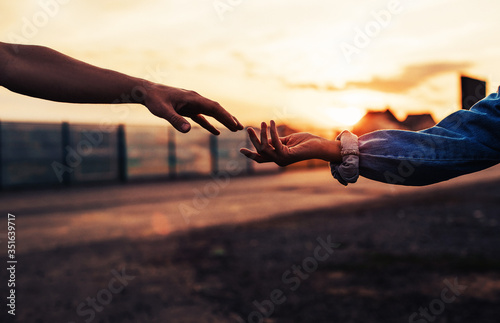 Fototapeta Naklejka Na Ścianę i Meble -  man and woman holding hands