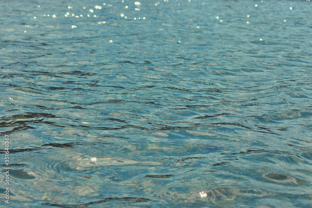 Water in the lake, waves, abstract background Water in the lake, waves, abstract background