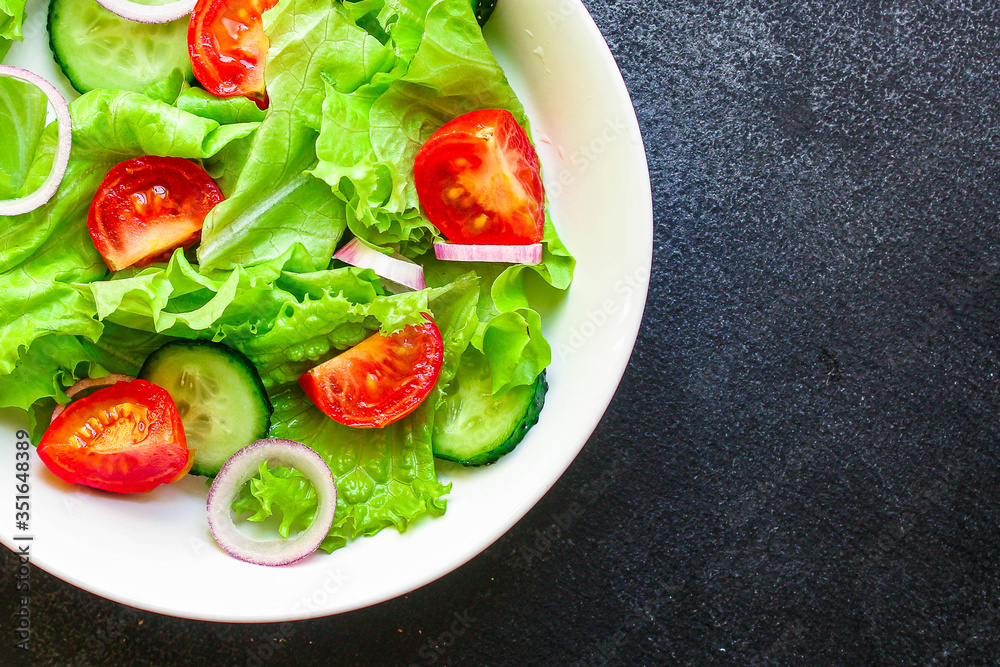 healthy salad (tomato, cucumber, mix leaves other ingredients) top menu concept. food background. copy space keto or paleo diet healthy salad (tomato, cucumber, mix leaves other ingredients) top menu concept. food background. copy space keto or paleo diet