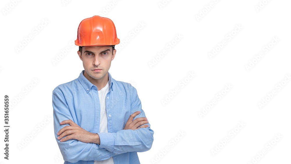 Attractive constructor in helmet, isolated background, copy space, 16:9 Attractive constructor in helmet, isolated background, copy space, 16:9